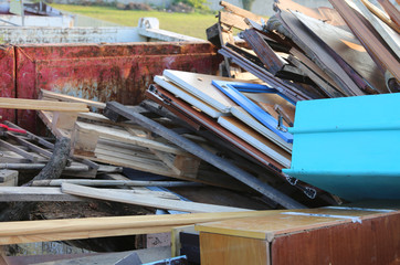 used wooden recyclables with boards and broken windows and doors removed
