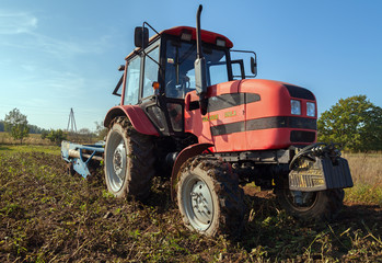 Digging of potatoes in a field.