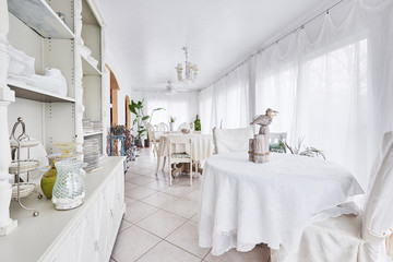 a bright white dining room