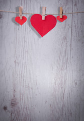 Valentine Hearts with handmade angels on a wood background, a good congratulatory card.