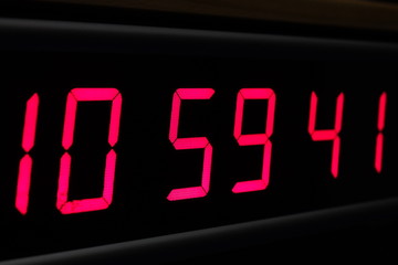 Red digital Timer, numbers counting.