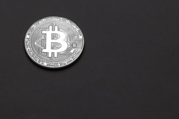 Bitcoin on a black background.