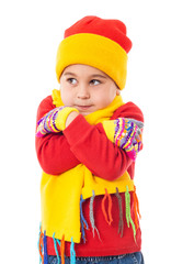 A girl in winter clothes who looks frozen