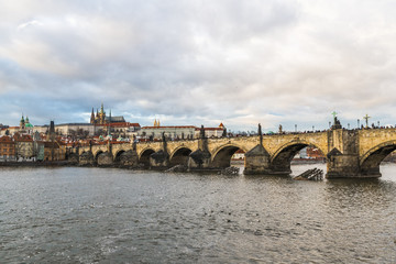 Fototapeta premium Winter sky over the Charles bridge in Prague