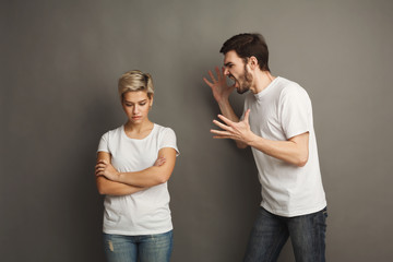 Couple in quarrel, woman shouting to boyfriend