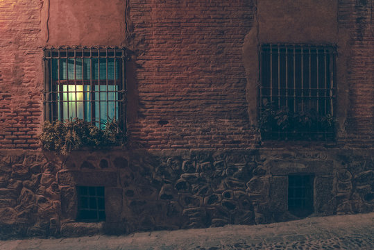 Windows on street at night