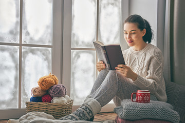 woman sitting by the window