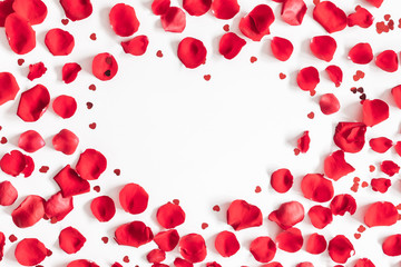 Flowers composition. Frame made of rose flowers, confetti on white background. Valentines day background. Flat lay, top view, copy space