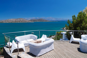 White sofas with Mirabello Bay view in Greece