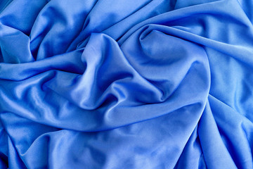 Blue silk textile background.