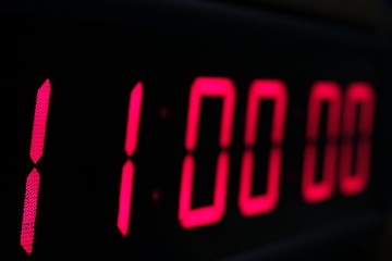 Red digital Timer, numbers counting.