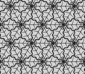 Oak leaves - decorative geometric seamless pattern. Monochrome graphic design. Vector ornament.