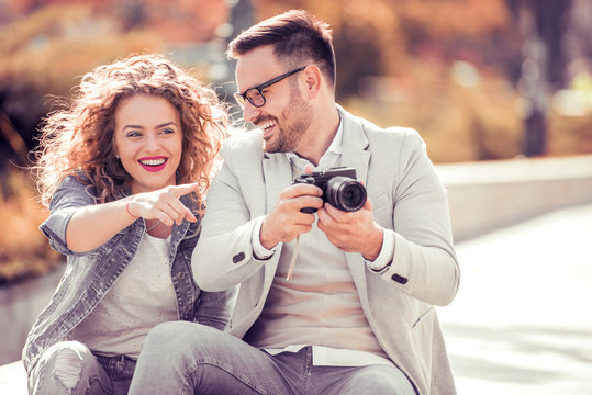 Young Couple Taking Photo Picture In The City.