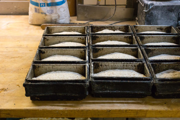 baking pastries and bread in an oven at a bakery