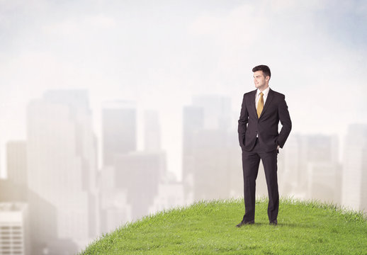 man standing in front of city landscape