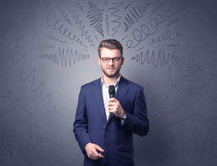 Businessman holding microphone