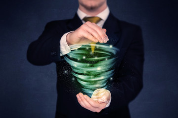 Businessman holding green tornado