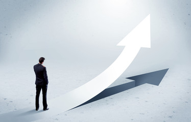 Arrow pointing up with standing salesman