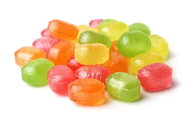 Rolgordijnen Pile of hard fruit candies © Coprid
