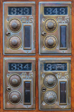 Four vintage american post office boxes