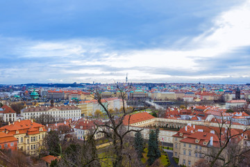 Fototapeta na wymiar View from above to tiled roofs of old town, Prague, Czech republ