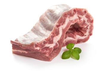 Fresh raw pork loin with ribs, close-up, isolated on white background.