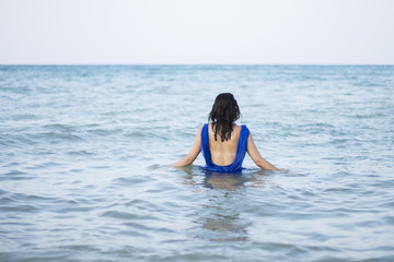 Lonely woman in the sea