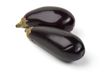 Fresh eggplant, close-up, isolated on white background.