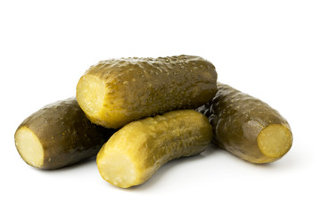 Pickled cucumbers on a white background, isolated.