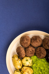 Norwegian or Sweedish Meatballs With Mushy Peas Boiled Potatoes and Cranberry Sauce