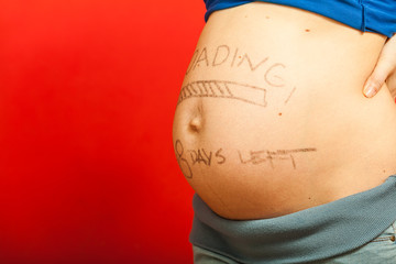 Pregnant woman belly with drawings