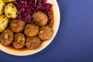 Swedish or Norwegian Meatballs With Boiled Potatoes  Red Cabbage and Gravy Meal