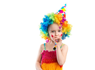 Profile view of little girl in clown wig