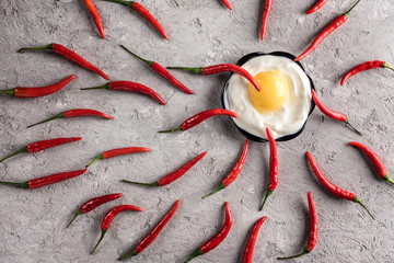 Hot chilli pepper concept winner sperm egg idea ovulation fertilization pregnancy - 188275285