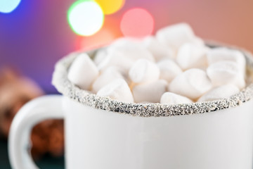 Fototapeta na wymiar Enamel White Coffee Mug Cup of Cocoa Hot Drink Beverage with Marshmallow