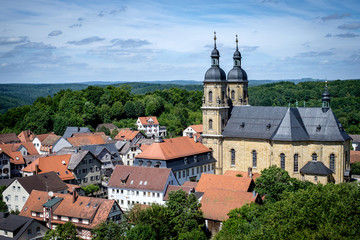 Fototapeta na wymiar Town Pottenstein in the district of Bayreuth, in Bavaria, Germany. View of church and house tops.