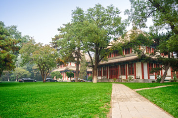 Fototapeta na wymiar Traditional Chinese buildings in campus. Located in Peking University, Beijing, China.