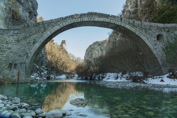 bridge old in Ioannina Zagori Greeece snow ice winter time