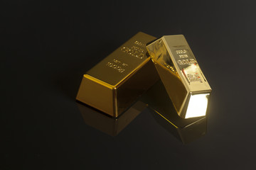 Gold bullion isolated on black background