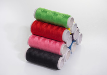 Colorful thread on white isolated background.