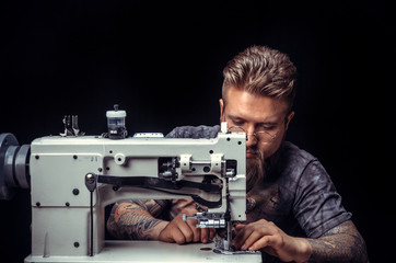 Leather Worker at work on his new leather product