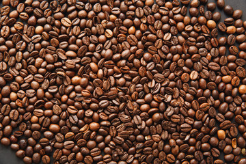 Coffee beans texture, brown background for design. Saint Valentine's Day card on fabruary 14, holiday concept.
