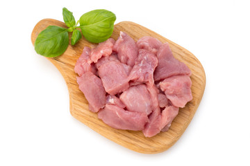 Raw chopped beef meat pieces isolated om white background cut out.
