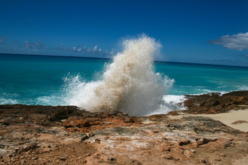 Waves crashed on the cliffs on the shore of St Martin