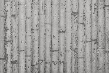 Obraz premium Modern concrete structure wall, Bamboo formwork imprinted on concrete wall, Modern original wall, Contemporary background concrete, Unique modern bamboo concrete background