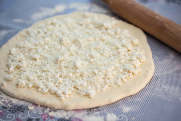 dough with cheese for cooking traditional Georgian dish khachapuri