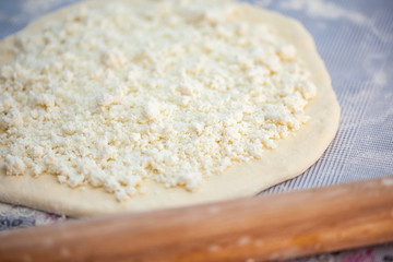 dough with cheese for cooking traditional Georgian dish khachapuri
