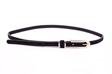 Fototapeta premium Black women's belt, strap isolated on white background