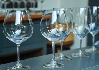 Wine glasses with reflection of Chicago cityscape in glass.