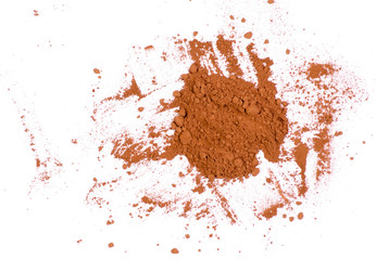 Pile cocoa on a white background